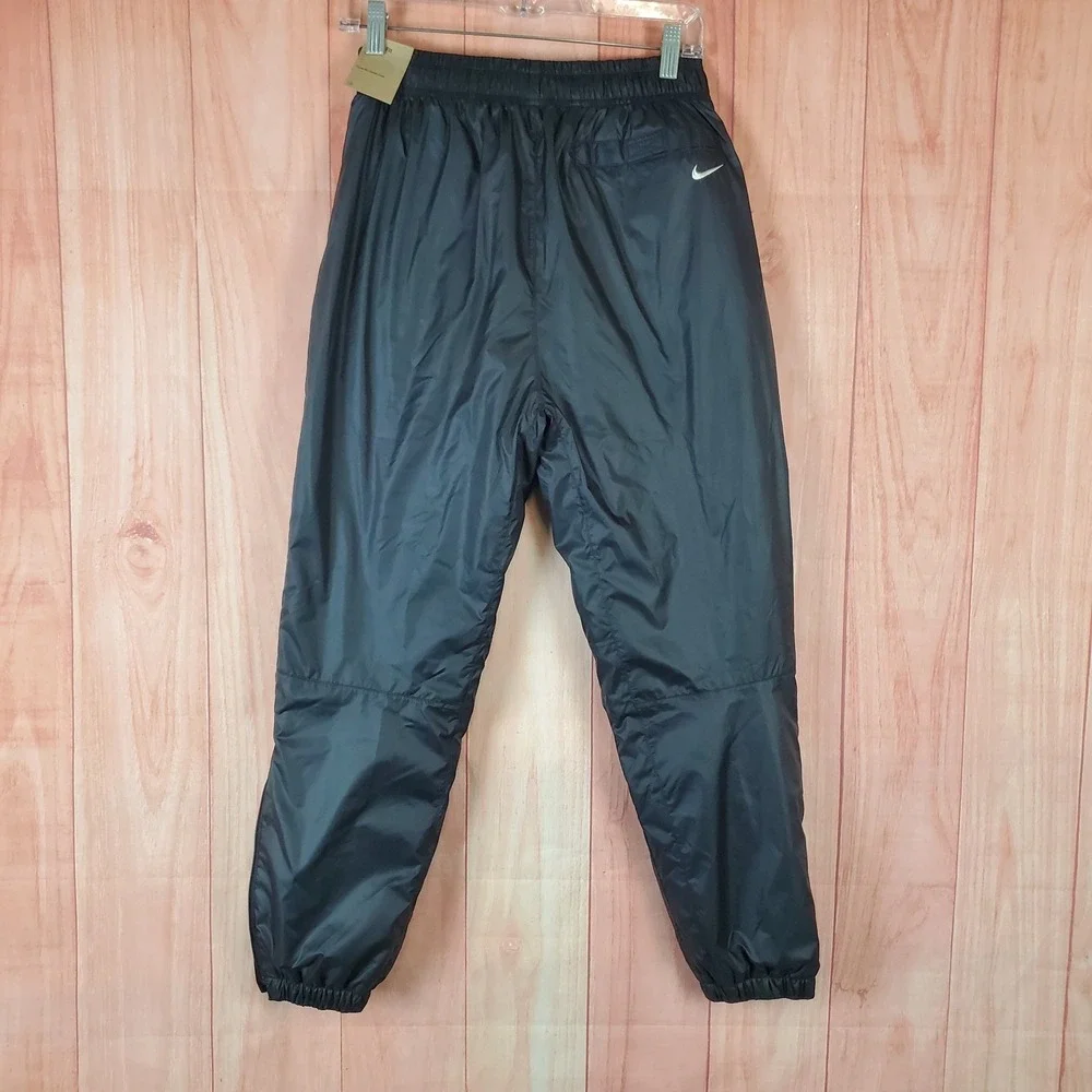 Nike Kids Windshell Pants Sz Large Black Elastic Waist 100% Polyester Pull On